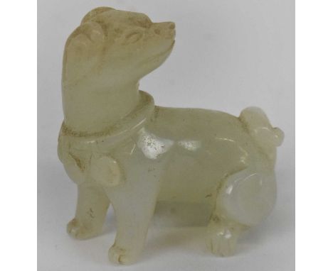 A small Chinese white jade figure of a dog, height 5cm, length approx 5cm.