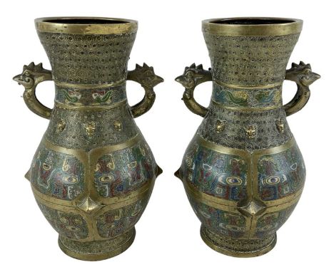 A pair of early 20th century Chinese brass cloisonné enamel twin handled vases, four character marks to base, height 30cm.