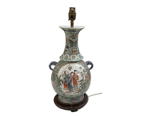 A modern Chinese Famille Rose porcelain table lamp, height to top of fitment 44cm.