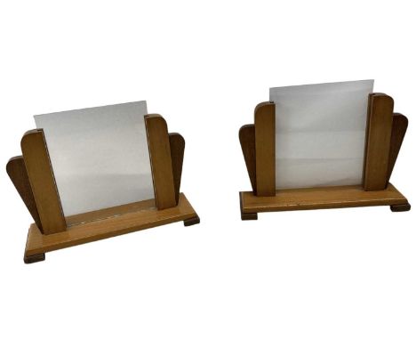 A pair of light oak Art Deco style photograph frames.