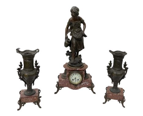 A 19th century pink marble and gilt metal mounted spelter figural mantel clock, 'A La Fontaine', with white enamel dial, heig