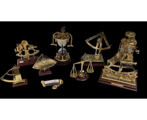 THE FRANKLIN MINT; a group of modern brass items including a National Maritime Historical Society ship lamp, sand timer, Gunn