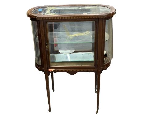 An Edwardian mahogany and inlaid oval display cabinet/bijouterie table, width 69cm, depth 39cm, height 89cm.Condition Report: