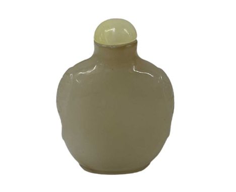 A Chinese carved green jade scent bottle, height 7cm.