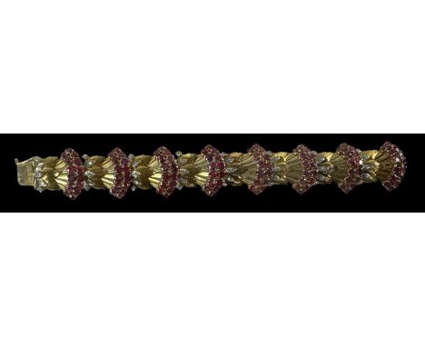 An 18ct yellow gold Art Deco style ruby and diamond set bracelet, length 18cm, approx 57.5g.