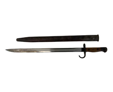 A WWI Wilkinson Sword bayonet, with scabbard, length 57.5cm.