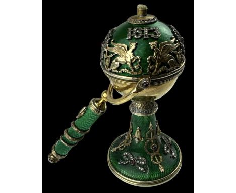 A Russian silver gilt green enamel and jewelled table lighter made to commemorate the Romanov Tercentenary 1613-1913, applied