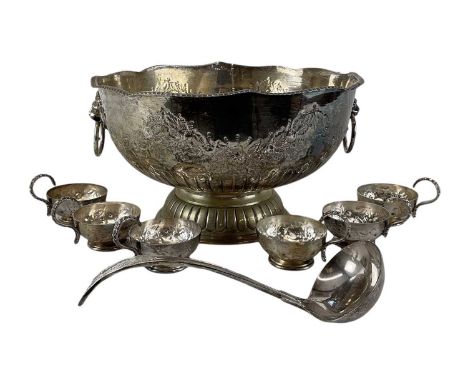 A silver plated punch set comprising large twin handled punch bowl, diameter 33cm, silver plated ladle and set of six silver 