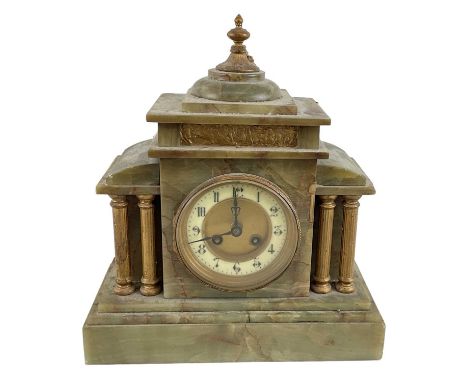 A late 19th century French onyx mantel clock with white enamel dial, height 32cm, width 29cm.