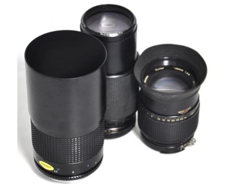 A Tokina 500mm f8 mirror lens, a Vivitar 80-200mm zoom lens, a further Vivitar 135mm F2.8 telephoto lens, all Nikon AI bayone