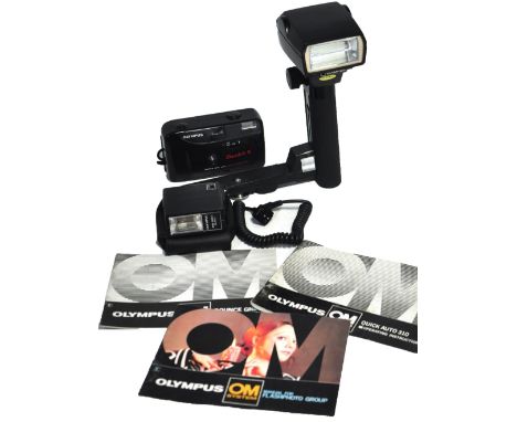 An Olympus auto 310 flash unit complete with bounce grip and TTL autocord, an Olympus PS200 compact flash gun complete with c