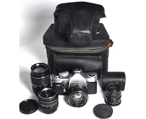 A Prinzflex TTL 35mm SLR camera with f1.4 55mm standard lens, ever-ready case, 135mm telephoto lens, 35mm wide angle lens, se