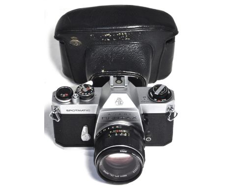 A Pentax Spotmatic II with 55mm f1.8 standard lens, filter, lens cap and original ever-ready case. CONDITION REPORT A particu