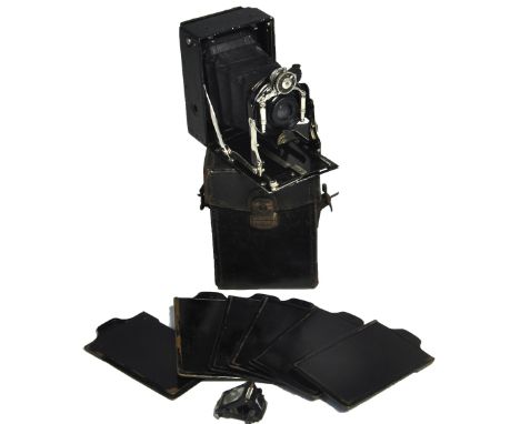 An Ernemann Heag XV vest pocket folding plate camera complete with case, six dark slides and collapsible view finder.  