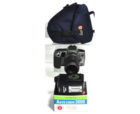 A Canon EOS10 35mm auto-focusing camera fitted with 35-135mm zoom lens and Oyster holdall, a Sunpak Auto zoom 3000 electronic