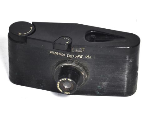 A Purma Special roll film bakelite camera complete with original case and instruction manual.