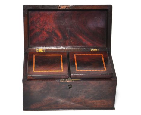 An early 19th century mahogany two compartment rectangular tea caddy.