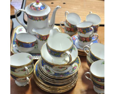 An Aynsley floral print decorated coffee service comprising coffee pot, jug, bowl, sandwich plates, six coffee cups and sauce