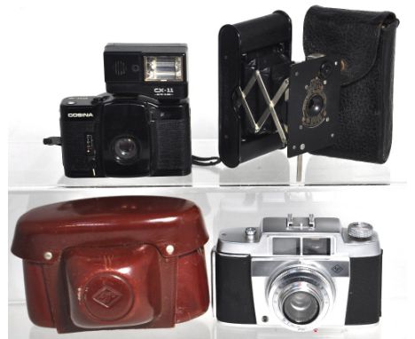 An Agfa Silette 35mm compact camera with carry case, a Cosina compact 35mm camera with dedicated flash unit and a Vest Pocket