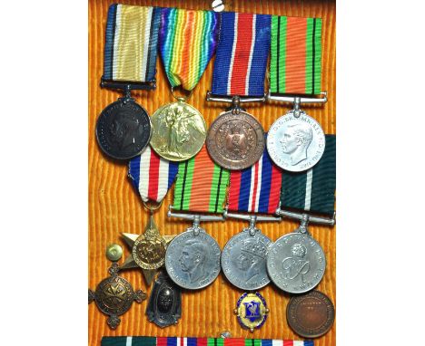 A family group of WWI and WWII medals; two WWI medals awarded to 73941 Private T.H.Leyland L'Pool R, a defence medal and good