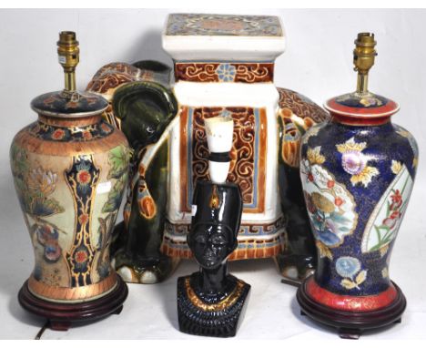 Two Oriental baluster lamps, a large ceramic elephant and a lamp in the form of an Ethiopian lady (4).