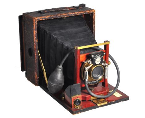 A Rochester Pony Premo No.3 5 x 4 folding camera with a Victor shutter and air release.