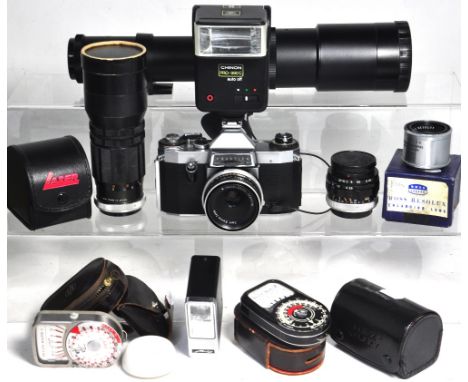 A Praktica Nova B camera with standard lens, 35mm wide angle lens, 180mm telephoto lens, 400mm telephoto lens and other acces