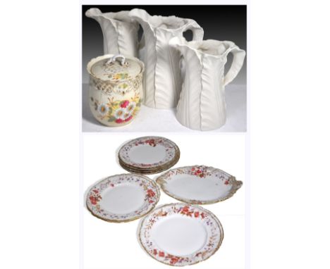 Three large Royal Worcester white glazed leaf decorated graduated jugs, green printed marks to base, a c.1900 Continental por