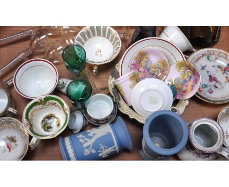 A mixed group of ceramics including hand painted cups and saucers, also a pair of Victorian vases modelled as boots, a carved