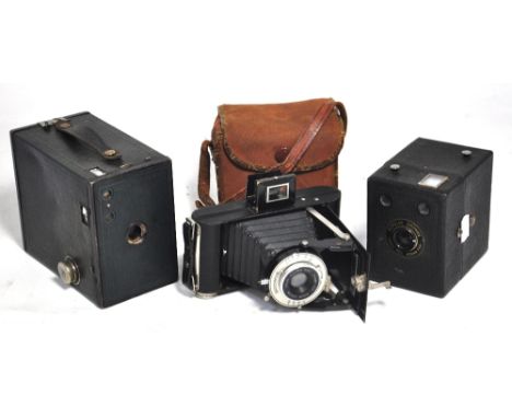 A Kodak No.2 Box Brownie in green leatherette finish, a further Kodak Box Brownie and a Kodak Brownie folding roll camera, al