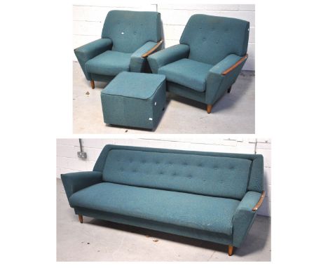 A retro 1960s three piece suite upholstered in turquoise tweed, with wooden arm rests, comprising a sofa bed and two arm chai