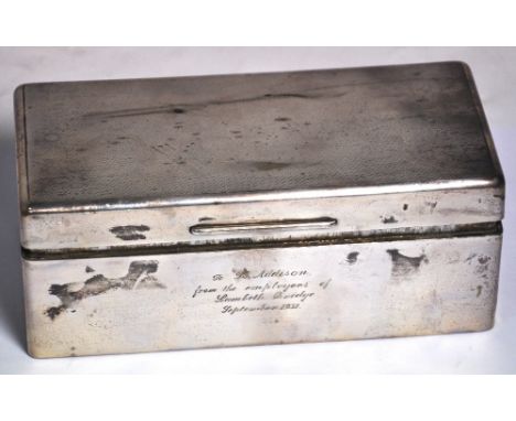 A George V hallmarked silver engine turned cigarette box, Birmingham 1925.