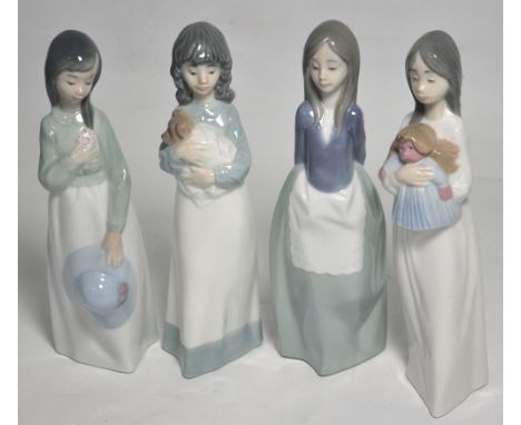 Four Nao figures, all of young ladies, one holding a hat, one cuddling a puppy, one holding a doll and the other with hands c