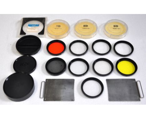 A selection of Hasselblad bayonet 50 fitting filters mainly by Tamron, to include orange, yellow, ultraviolet diffuser, polar