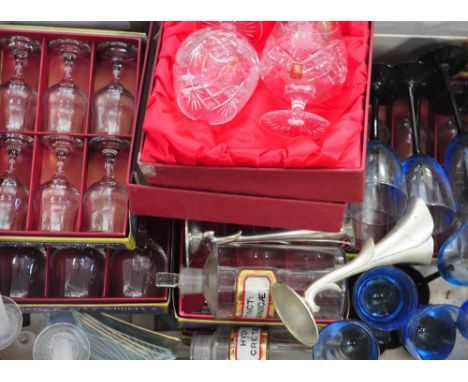 A box of vintage blue wine glasses and a quantity of crystal drinking glasses and other glassware.