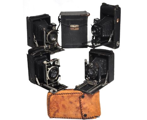 A Zeiss Ikon folding 6 x 9 plate camera model 668/2 complete with film back and original carrying case, a Zodel folding 6 x 9