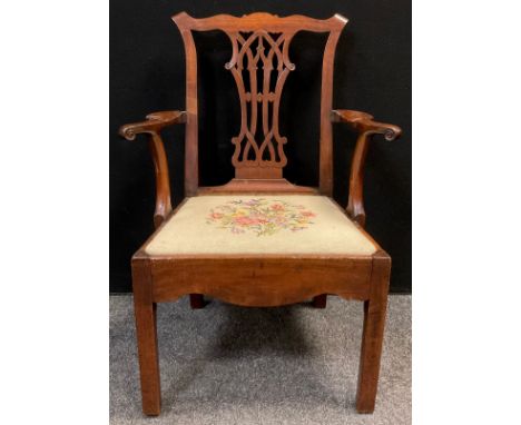 A 19th century Chippendale revival mahogany armchair, pierced and carved splat, serpentine arms with scroll ends, square legs