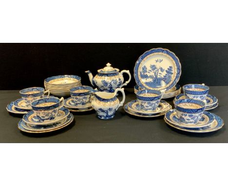 Booths 'Real Old Willow' pattern tea service including a tea pot, six tea cups and saucers, six side plates and desert bowls;