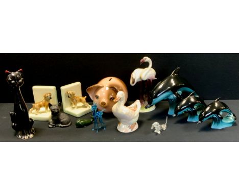 A Poole pottery model, leaping Dolphin;  others smaller;  Wein Keramos flamingos;  boxer dog bookends, pig money bank etc 
