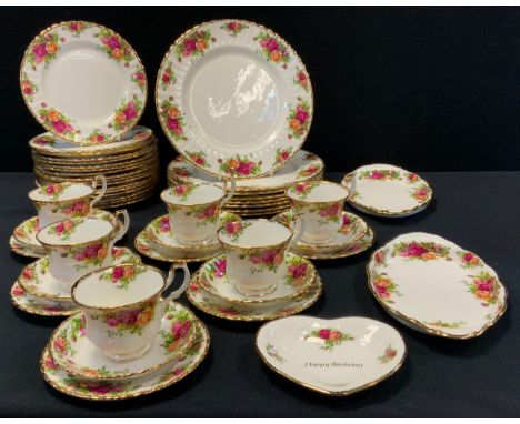 Royal Albert Old country roses part table service, including; six tea cups and saucers, eight large dinner plates, seventeen 