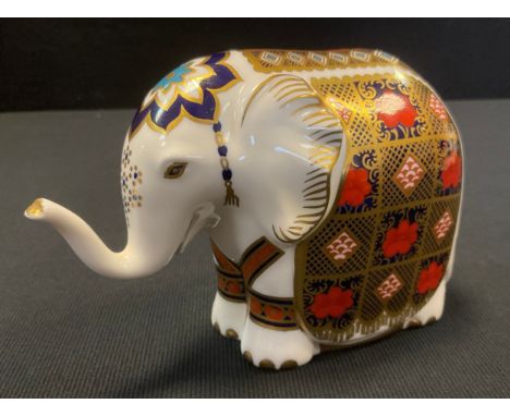 A Royal Crown Derby paperweight, Elephant, decorated in the 1128 Imari palette, date mark for 1990, Royal Crown Derby stamp t