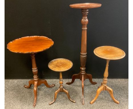 A reproduction mahogany torchere / pot stand, dished circular top, turned columnar support, tripod base, 103.5cm high x 30cm 