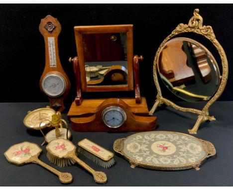 A Smiths cockpit/dashboard clock, Cricklewood Works, London, serial no P-37 495, oak frame;  aneroid barometer, shaving mirro