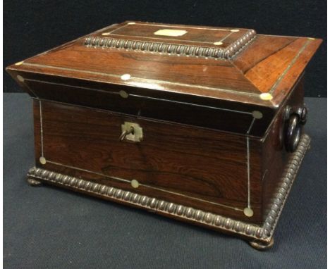 A Victorian inlaid rosewood jewellery box, sarcophagus form inlaid with mother of pearl detailing, drop loop ring handles, hi