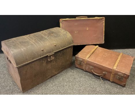 An Army Officer’s Tin travelling trunk, c.1919, dome-top lid, 45cm high x 68cm wide x 43cm;  two leather suitcases, (3). 