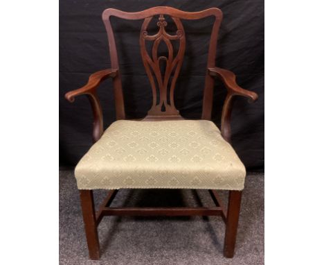 A 19th century Chippendale style mahogany elbow chair, serpentine top rail, pierced and carved splat, square legs, 94cm high 