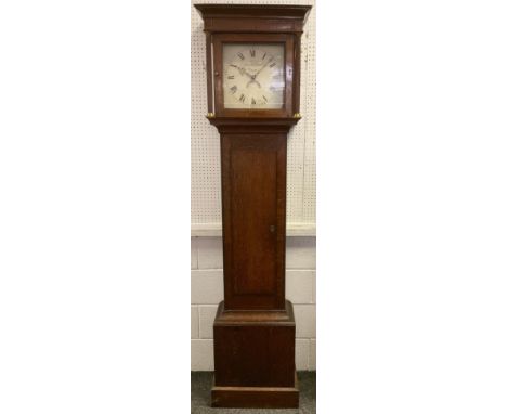 A 19th century Longcase clock, white enamelled face with Roman numerals, and calendar dial, oak case, moulded cornice, decora