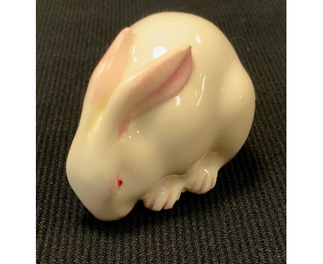 A Royal Worcester porcelain Rabbit netsuke, picked out in pink, printed marks, c.1926 
