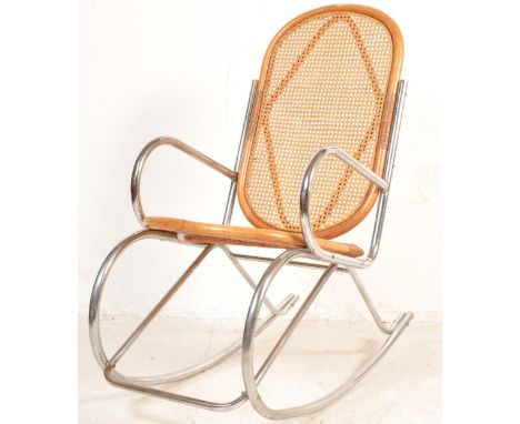 After Marcel Breuer - A vintage retro 20th century circa 1980s rocking chair having cane backrest and seat with wooden frame 