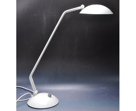 A retro vintage 20th century circa 1990s desk top lamp having an adjustable circular light shade with twin tubular supports r
